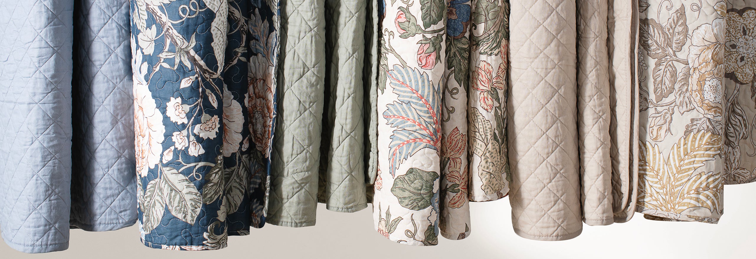 Soft quilts in Spring colors and patterns.